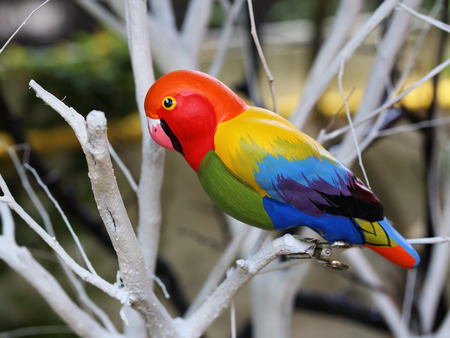 Colorful display of artificial parakeet objectsの写真素材