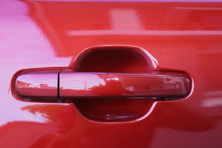 close up of Red car door handleの写真素材