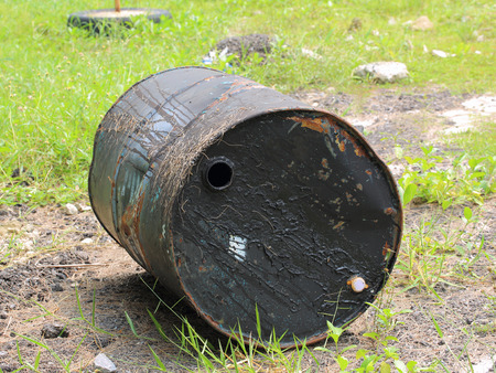 rusty metal oil barrels port side, empty, recycle for somethingの写真素材