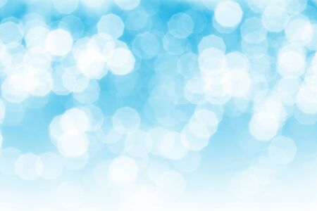 light blue bokeh background for usageの写真素材