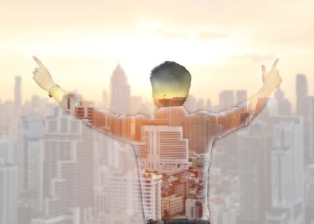 Double exposure of success business man, freedom man concept of financeの写真素材