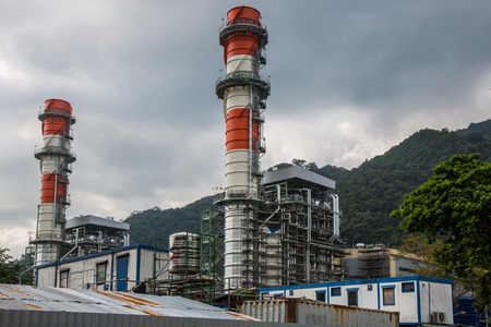 Petroleum and power electricity factory under cloudy sky , South industrial of Thailandの写真素材