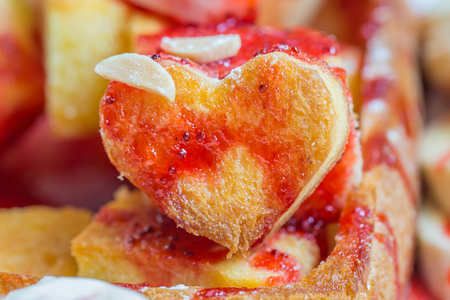 Close up of heart bread with Strawberry sherbet toast, ice cream.の写真素材