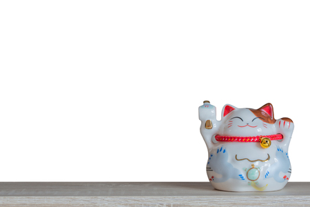 Lucky cat piggy bank on white background, abstract background to time to start to saving or lucky for keep money concept.の写真素材