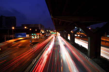 Beautiful of the light from the taillights and headlights while on the moving at the night.の写真素材