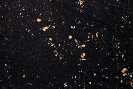 Black granite with orange and white stripes use for background and design.の写真素材