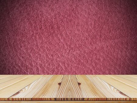 Pine wood top on dark red deerskin background - used for display or montage productsの写真素材