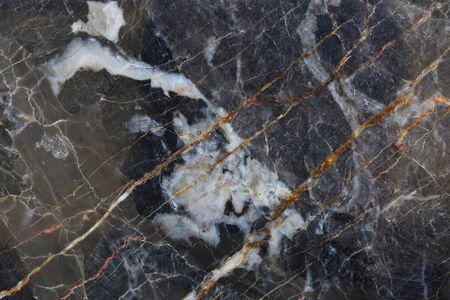 Patterned structure of dark gray marble (gold russia) texture background for product design.の写真素材