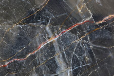 White yellow and gold Patterned natural of dark gray marble (gold russia) texture background for product design.の写真素材