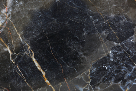 Patterned natural of dark gray marble (gold russia) texture background for product design.の写真素材