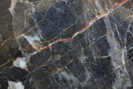 Patterned structure of dark gray marble (gold russia) texture.の写真素材