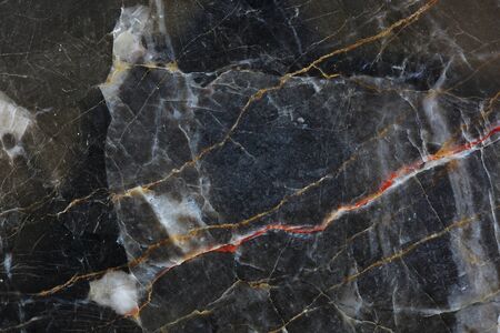 Patterned natural of dark gray marble (gold russia) texture.の写真素材