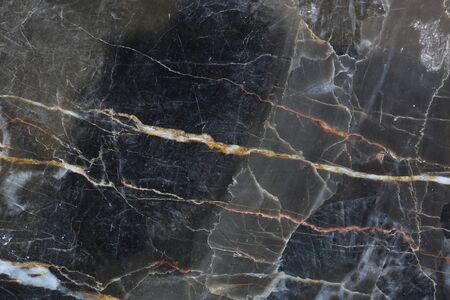 Gold and white patterned natural of dark gray marble (gold russia) texture.の写真素材