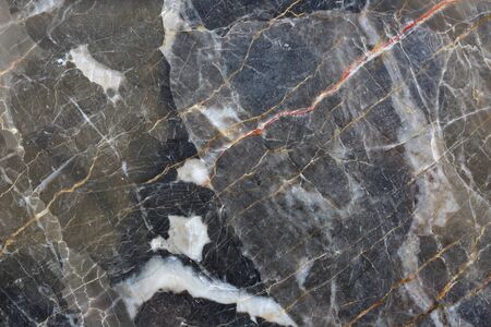 Patterned structure of dark gray marble pattern (Gold Russia) for design and background.の写真素材