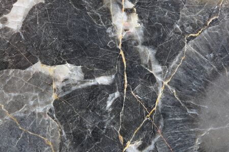 Gold patterned natural of dark gray marble pattern (Gold Russia) background texture for design.の写真素材