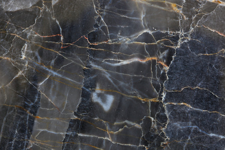 Close up of Patterned natural of dark gray marble pattern (Gold Russia) for design.の写真素材