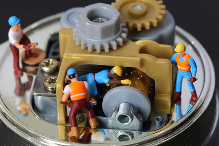 Selective focus of miniature engineer and worker fixed and repair musical box, use for product background.の写真素材