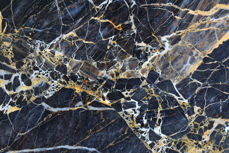 Gold and white patterned natural of dark marble pattern texture for design.の写真素材