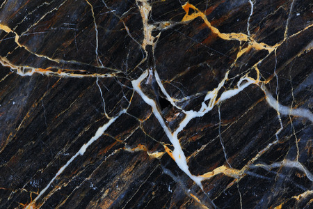 Yellow and white patterned structure of dark marble pattern texture. Abstract marble background.の写真素材