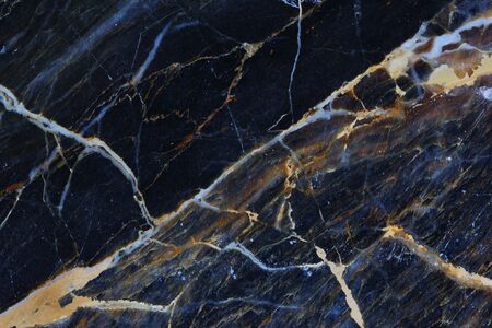 Gold and white patterned natural of Dark gray marble pattern texture background - used for display, marble design or montage productsの写真素材