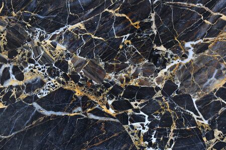 Gold, yellow and white pattern natural of gray marble texture.の写真素材