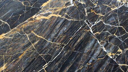 White, gold and yellow patterned natural of dark gray marble texture for product design. Abstract backgroundの写真素材