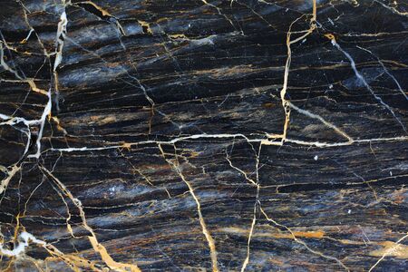 Yellow and white patterned natural of dark marble pattern texture. Abstract marble background.の写真素材