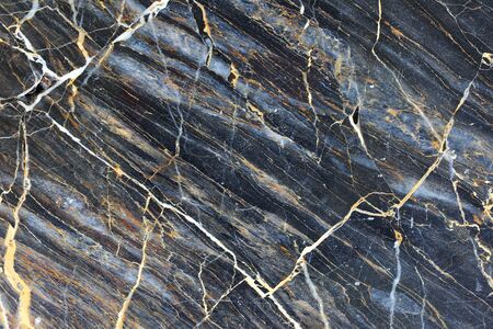 Yellow and white patterned natural of dark gray marble pattern texture for design product.の写真素材