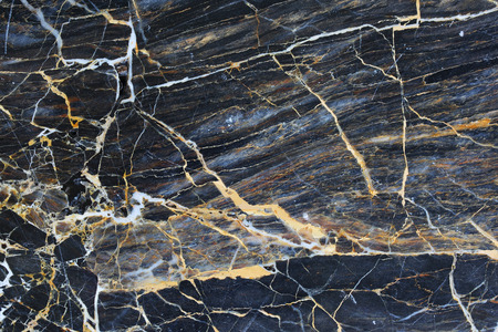 Gold patterned natural of dark marble pattern background texture.の写真素材