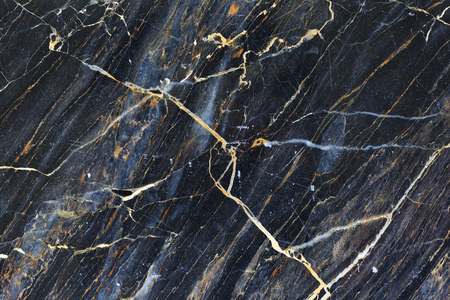 Gold yellow patterned structure of dark marble pattern texture for background.の写真素材