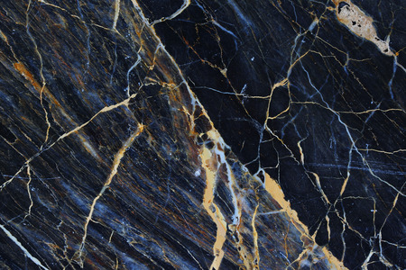 Yellow and white patterned natural of dark marble pattern texture. marble background.の写真素材