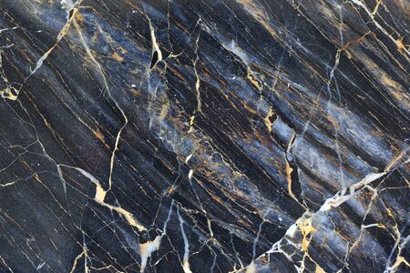 Abstract marble background. Yellow and white patterned structure of dark marble pattern background texture for interior design.の写真素材