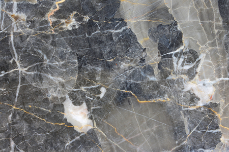 Patterned structure of dark gray marble (Russia Gold) background texture for product design.の写真素材