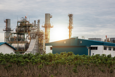 This is oil and gas refinery industry plant, sunset and Chemical storage tanks.の写真素材