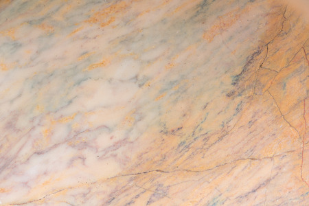detailed structure of marble in natural patterned for background and product design. orange cream marble texture.の写真素材