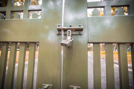 lock on the gate, shadow vintage door.の写真素材