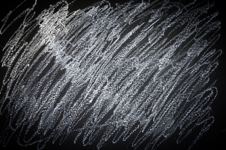 Chalk on blackboard background, texture for abstract designの写真素材