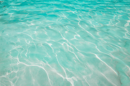 Sea water texture, motion blur background at similan beach.の写真素材