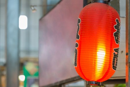 Light bulb and red lamp as abstract and interior design concept.の写真素材