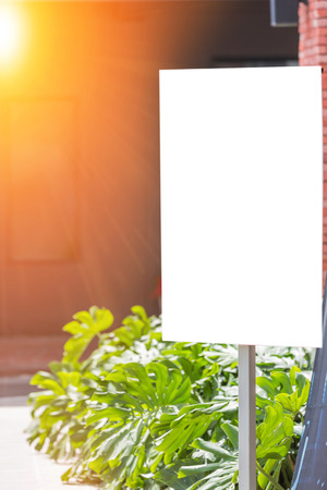 white blank billboard and sunset - can advertisement for display or montage product and businessの写真素材