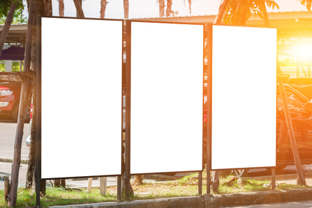 white blank billboard and sunlight of sunset - can advertisement for display or montage product and businessの写真素材