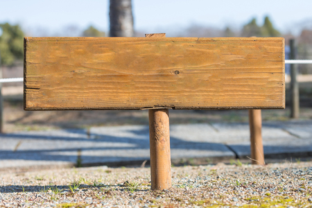 Wooden sign isolated on nature backgroundの写真素材