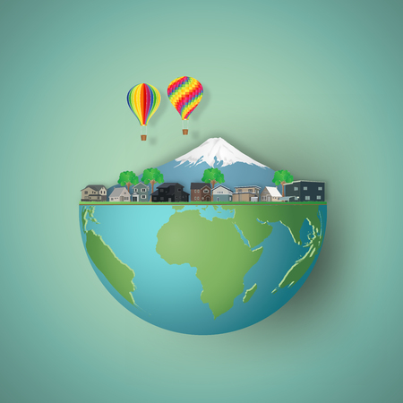 ouses, colorful hot airi balloons and mountain on hemisphere green world as business, nature, eco and love earth day concept. vector illustration of paper art and craft style.のイラスト素材
