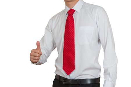 Businessman give a thumbs up for compliment isolated on white background as praise, congratulate, good and like concept.の写真素材