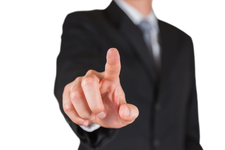 Businessman give a finger touching isolated on white background as business, praise, choose and point target conceptの写真素材