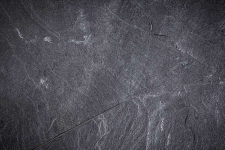 Dark grey and black slate texture or backgroundの写真素材