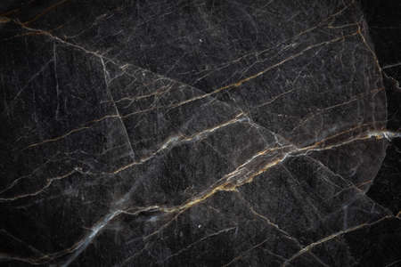 White and yellow patterned natural detailed of dark gray marble (Russia Gold) texture background for interior or product designの写真素材