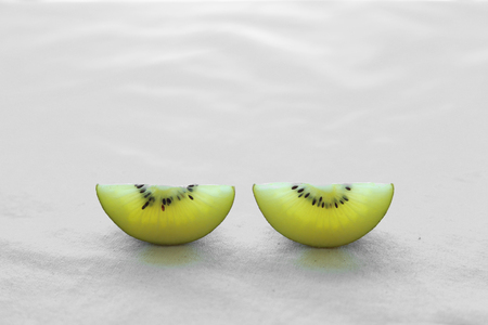 Two Slice Gold Kiwifruitの写真素材