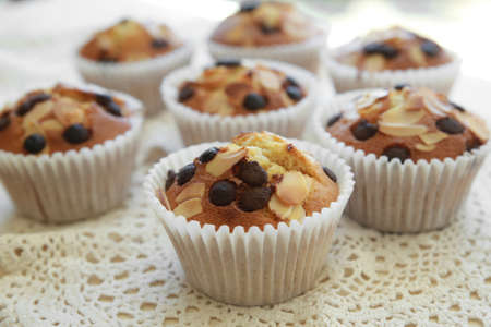 Homemade apricot chocolate chip almond slice muffinsの写真素材