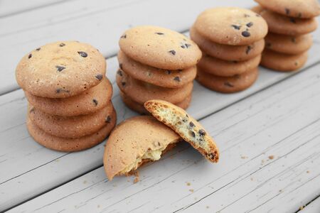 Homemade chocolate chip cookies on wooden tableの写真素材